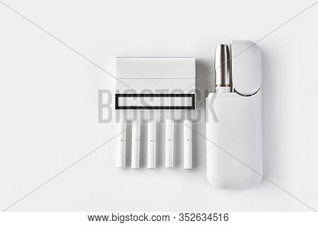 New Generation Electronic Cigarette In Open Battery, One Pack, Five Heatsticks Isolated On White. Hi