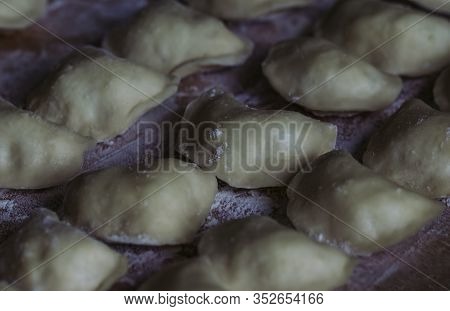 Vareniks. Slavic Food. Ukrainian National Dish. Traditional Dish The Process Of Preparing Vareniks. 