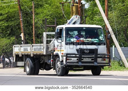 Maun, Botswana - February 9, 2020: Flatbed Truck Nissan Diesel Ud80 In The Town Street.