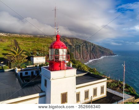 Aerial Photo With Drone Of Ponta Do Pargo Lighthouse With Mountains On The Background In Madeira