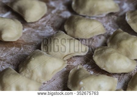 Vareniks. Slavic Food. Ukrainian National Dish. Traditional Dish The Process Of Preparing Vareniks. 