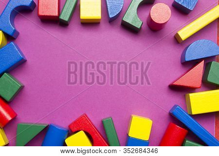 Kids Educational Developing Toys Frame On White Background. Top View. Flat Lay. Copy Space For Text