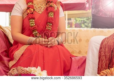 An Unrecognizable Bride On Indian Wedding Ceremony, Traditional Wedding Ritual Of Marriage