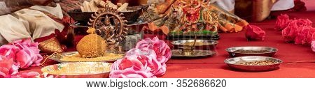 Wedding Ceremony, Traditional Indian Hindu Marriage Ritual With Red Flowers And Attributes