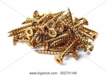 Torx Screws Close Up. Gold Screws For Wood, Chipboard Or Plywood With Torx Head.