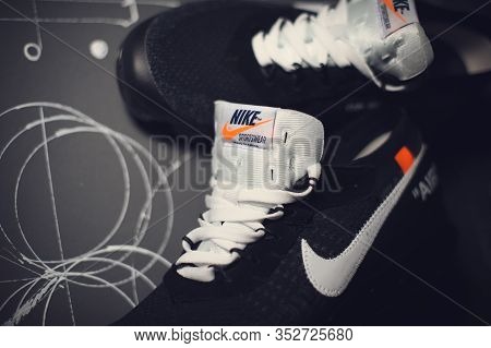 Reebok Gl 6000 Mid Sneakers Shot Outdoor On Dark Industrial Background. Krasnoyarsk, Russia - Januar