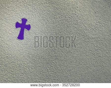 Ash Wednesday, Lent Season And Holy Week Concept. A Christian Holy Cross Shape On Background Of Scat