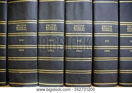 London, Uk - September 21, 2019: Bound Copies Of The British Medical Journal On A Shelf In A Referen