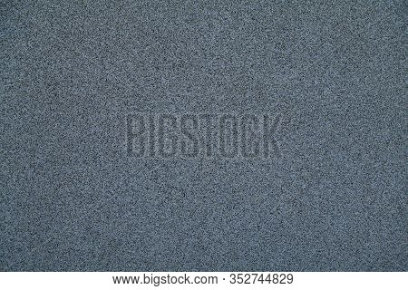 Mosaic And Granulated Textured Coating, Texture, Background. Structural Plaster, Rough, Uneven Surfa