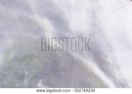 Abstract Pearl Background With Shimmering Hues Of Mauve And Ocean Blue Colours