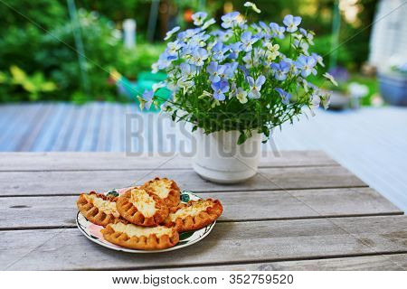 Karelian Pies (karjalanpiirakka) Made Of Thin Rye Flour With A Filling Of Rice Served For Breakfast.