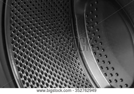 Used Drum Of The Washing Machine. Delicatized Shot Of The Inside Of The Washing Machine. Reliable Ho