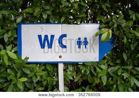 Sign For The Wc (watercloset, Or Toliet) In Blue And White, For Men And Women