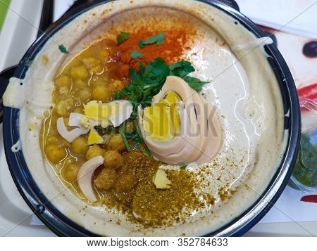 Dish Of Fresh Hummus With Olive Oil And Parsley Middle East Arabic Food