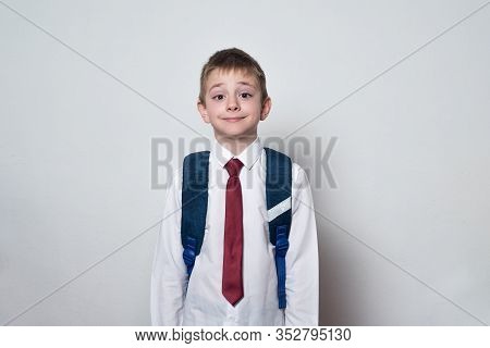 Cute Schoolboy With School Uniform On White Background. Middle School, Junior High School