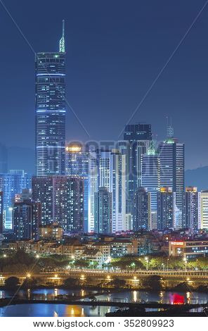 Skyline Of Shenzhen City, China At Night. Viewed From Hong Kong Border