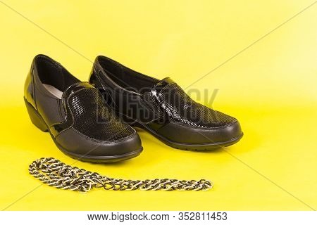 Woman's Red Stylish Lacquered Loafer Shoes. Pair Of Trendy Female Penny Loafers Shoes