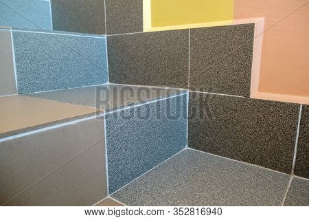 Wide Staicase Covered With Ceramic Tiles Indoors In A House Interior.