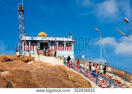 TIRUCHIRAPPALLI, INDIA - JANUARY 10, 2010: Hindu Vinayaka Temple, Rock Fort Temple dedicated to Ganesha, Ganesh, Ucchi Pillayar (Ucchipillayar) Koil, Trichy, Tamil Nadu. Rock top mandir with visitors