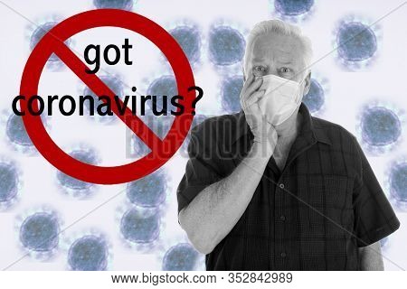 Coronavirus. Convid-19. A medical patient wears a face mask in a NO CORONAVIRUS image. CONVID-19 is spreading world wide.
Coronavirus2019 graphic in back. got coronavirus text. International NO symbol