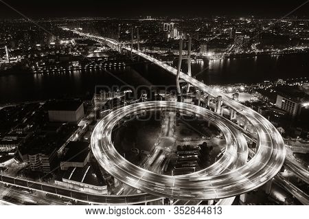 Shanghai Nanpu Bridge over Huangpu River with busy traffic in China.