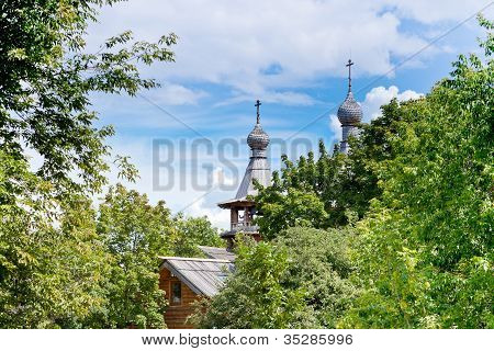 Wooden Church In Green Garden