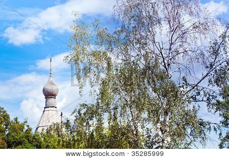 Wooden Dome Of Russian Church And Birch