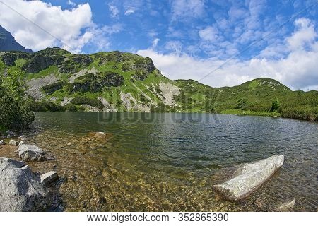 Lake Rohacske Plesa, West High Tatras Mountains, Slovakia In Summer