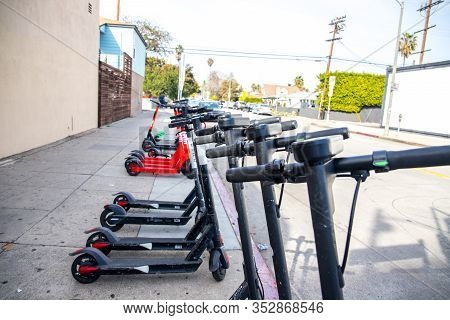 Los Angeles/usa- 02.02.2020 :    Many Rental Electric Sccoter On The Sidewalk  Lyft