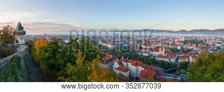 Colorful Autumn Colors, Bright Blue Sky In The Park And Eggenberg Palace In Graz, Styria Region, Aus
