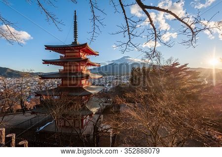 The Last Rays Of The Setting Sun Illuminating Mount Fuji And The Churito Pagode On A December Winter