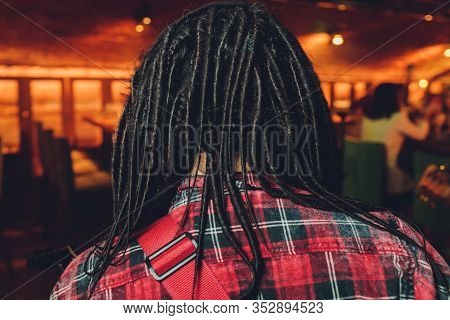 Texture Of Thin Brown Pigtails, Afro Style.