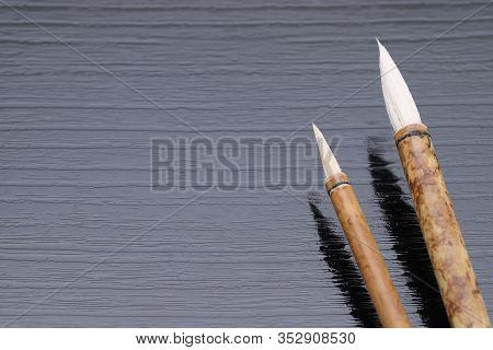 Japanese Traditional Writing Brush On Black Background