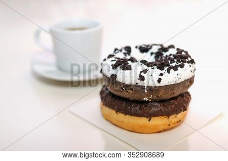 Coffee And Two Donuts For Breakfast Close Up
