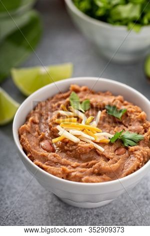 Refried Beans In A White Bowl, Mexican Dish