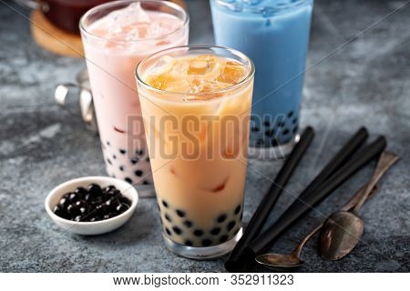 Variety Of Milk Bubble Tea In Tall Glasses, Strawberry, Butterfly Tea And Black
