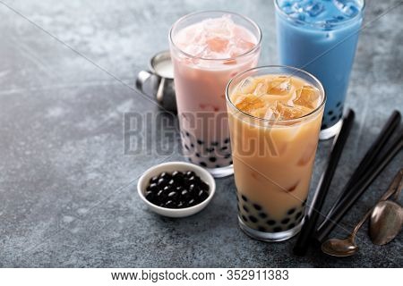 Variety Of Milk Bubble Tea In Tall Glasses, Strawberry, Butterfly Tea And Black