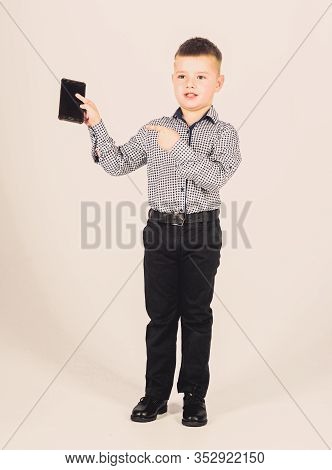 Confident Child Has Business Start Up. Modern Life. Small Boy With Mobile Phone. Little Boss. Ceo Di
