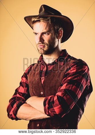 Wanted. Western Cowboy Portrait. Man Checkered Shirt On Ranch. Vintage Style Man. Wild West Retro Co