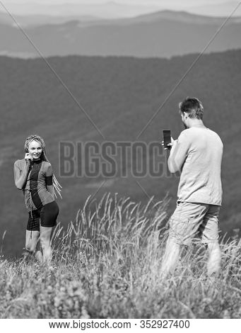 One More Shot. Travel Together With Darling. Couple Taking Photo. Couple In Love Hiking Mountains. L