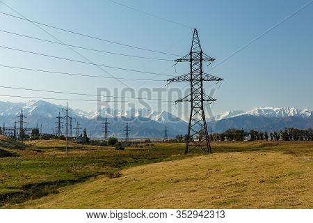High-voltage Power Line In The Mountains, Electric High Voltage Power Post, Chuy Region, Kyrgyzstan