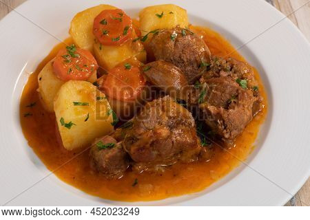 Navarin Lamb Shank Stew On Wood Table And And Potatoes, High Quality Photo