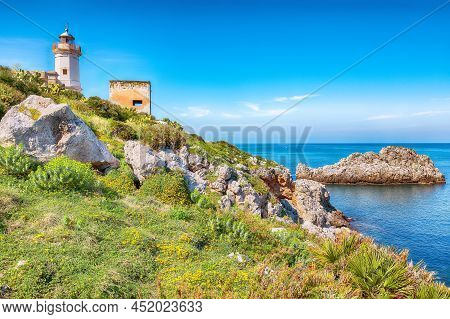 Stunning Sunny Day Over Capo Zafferano Lighthouse. Popular Travel Destination Of Mediterranean Sea. 
