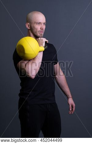 Guy With A Yellow Kettlebell Gym Anonymous Young Strength, For Sporty Lifestyle For Strong And Floor
