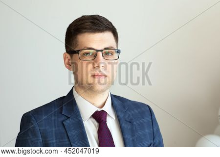 Portrait Of A Male Freelancer. Decentralized Work Of Digital Nomads, Hybrid Work Model.