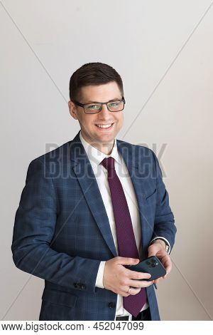 Portrait Of A Male Freelancer. Decentralized Work Of Digital Nomads, Hybrid Work Model.