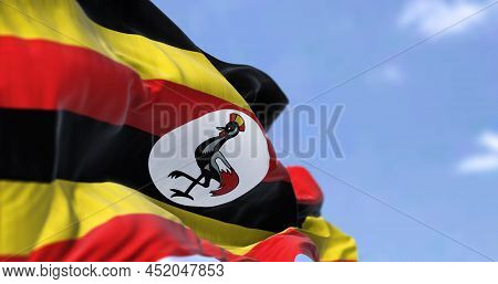 Detail Of The National Flag Of Uganda Waving In The Wind On A Clear Day. Uganda S A Landlocked Count