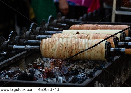 Kurtos Kolacs (kürtőskalács). Traditional Hungarian Cake, Baked With Sugar, Honey And Nuts
