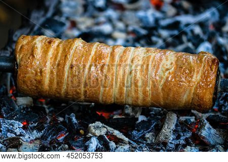 Kurtos Kolacs (kürtőskalács). Traditional Hungarian Cake, Baked With Sugar, Honey And Nuts