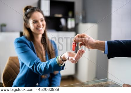 Real Estate House Sale Key Handover . Property Ownership